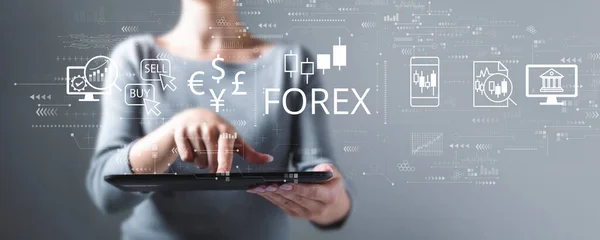 Forex trading concept with woman using a tablet — Zdjęcie stockowe