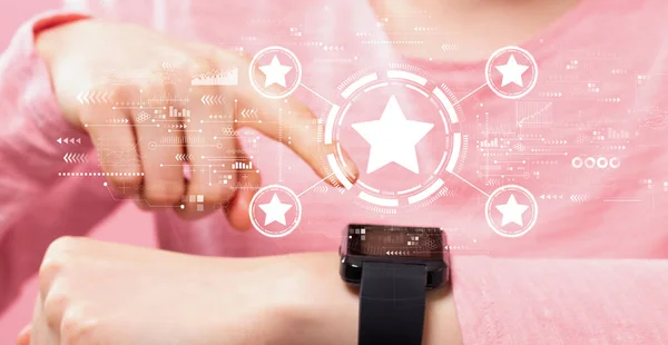 Rating star concept with woman pressing smart watch — Stok fotoğraf