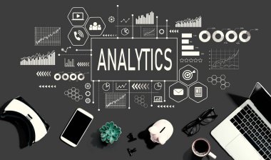 Analytics with electronic gadgets and office supplies - flat lay