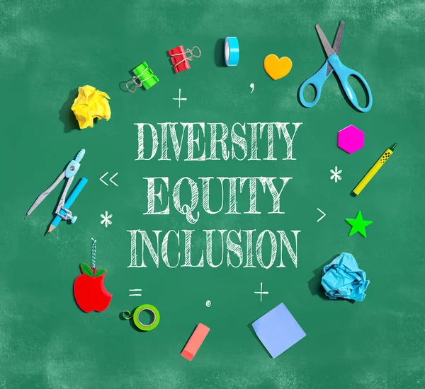 Diversity, Equity and Inclusion theme with school supplies on a chalkboard - flat lay