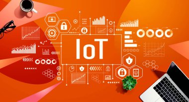 IoT theme with a laptop computer on a orange pattern background