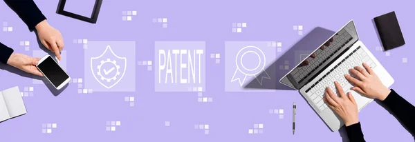 Patent Concept Two People Working Together — Stockfoto