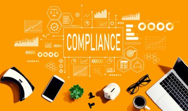 Compliance theme with electronic gadgets and office supplies - flat lay