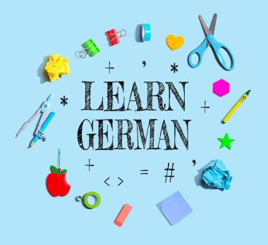 Learn German theme with school supplies overhead view - flat lay