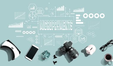 Micropayments theme with electronic gadgets and office supplies - flat lay clipart