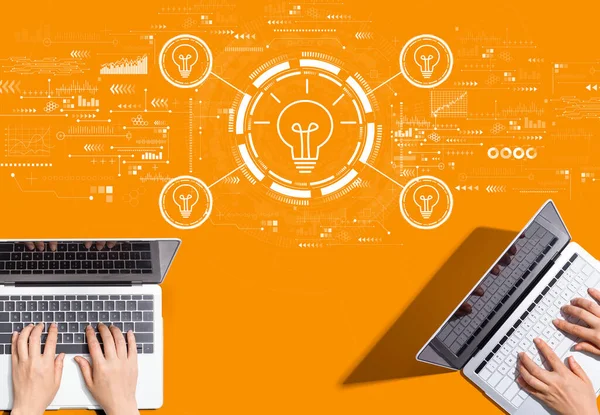 Idea Light Bulb Theme People Working Together Laptop Computers — Stockfoto