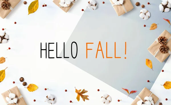 Hello fall message with gift boxes with autumn leaves