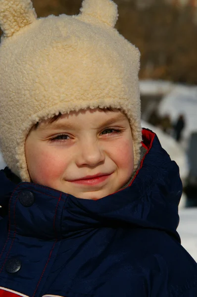 The cheerful boy in winter clothing close-up — Stock Photo, Image