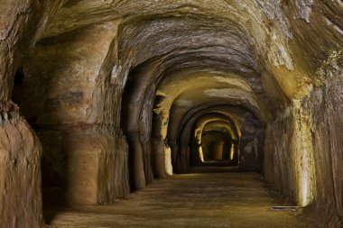 Air raid shelter of World War II, old tunnel dug into the tufa rock where people took refuge during the bombings