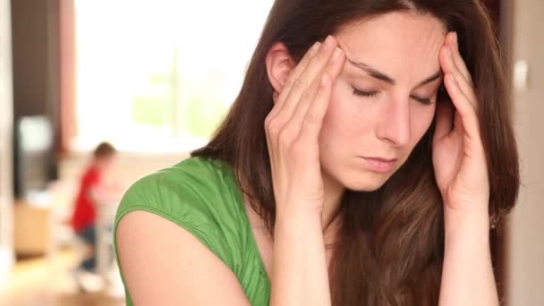 Young women suffering from headache — Stock Video