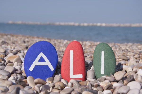 Ali, nombre masculino en piedras de colores — Foto de Stock