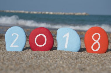 renkli taşların üzerinde mutlu bir 2018