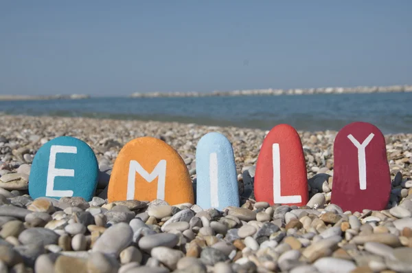 Emily, weiblicher Name auf bunten Steinen — Stockfoto