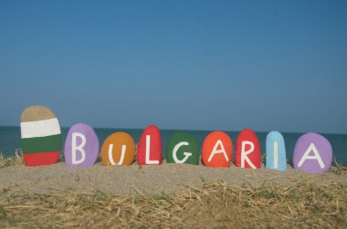 Souvenir of Bulgaria, България, on colourful stones clipart