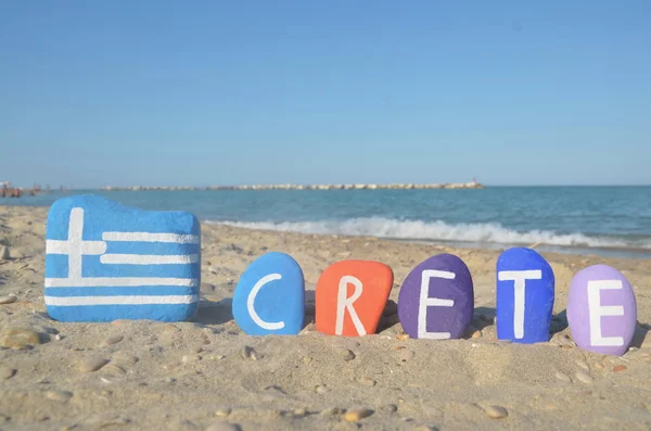 Souvenir of the greek isle Crete on colourful stones — Stock Photo, Image