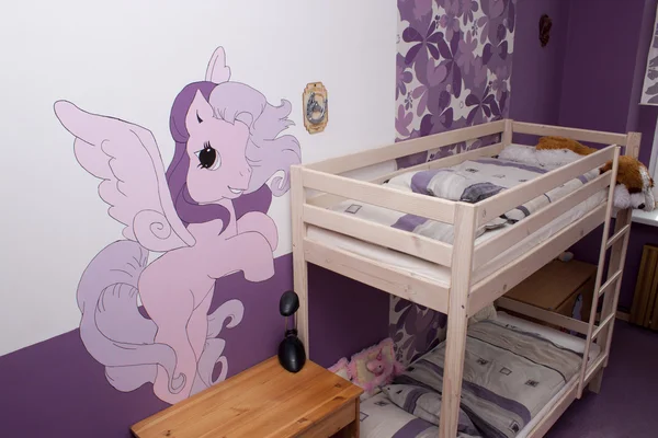 Färgglada rum med ponny Stockfoto
