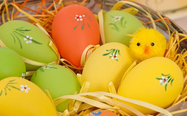 Easter eggs on a basket — Stock Photo, Image