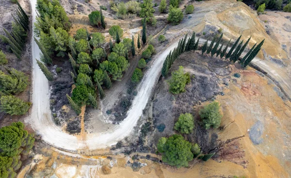 Aerial drone view of abandoned copper mine area with red toxic dry sand. Environmental pollution. Deforestation — Stock Photo, Image