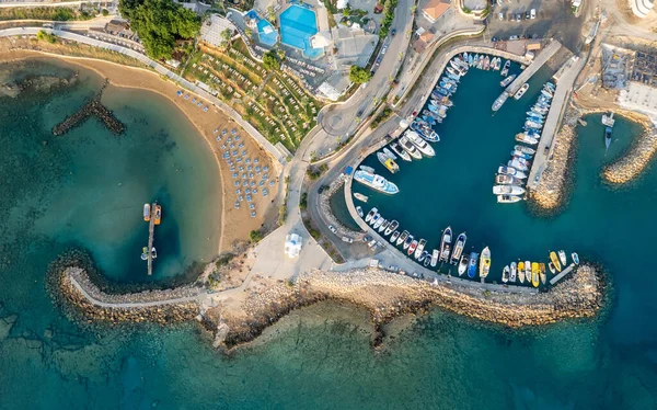 Drone aerial scenery of a fishing port at pernera Protaras Cyprus. Fishing boats moored in the harbour