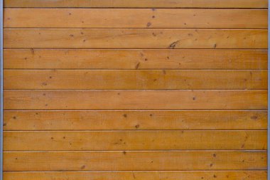 Kahverengi tahta duvarın tam kare görüntüsü. Arkaplan.