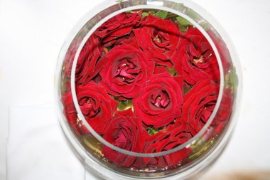 Roses in a glass clipart
