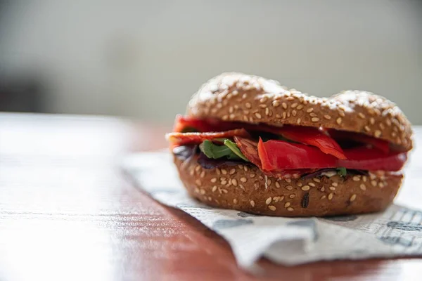 Delicious lunch in work, tasty sandwich with salami — Stock Photo, Image