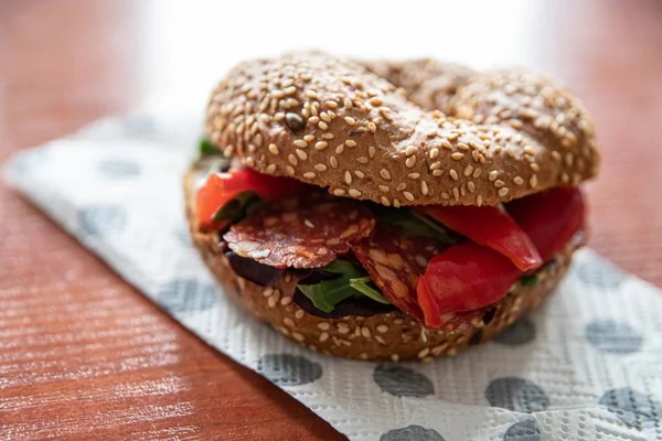 Delicious lunch in work, tasty sandwich with salami — Stock Photo, Image