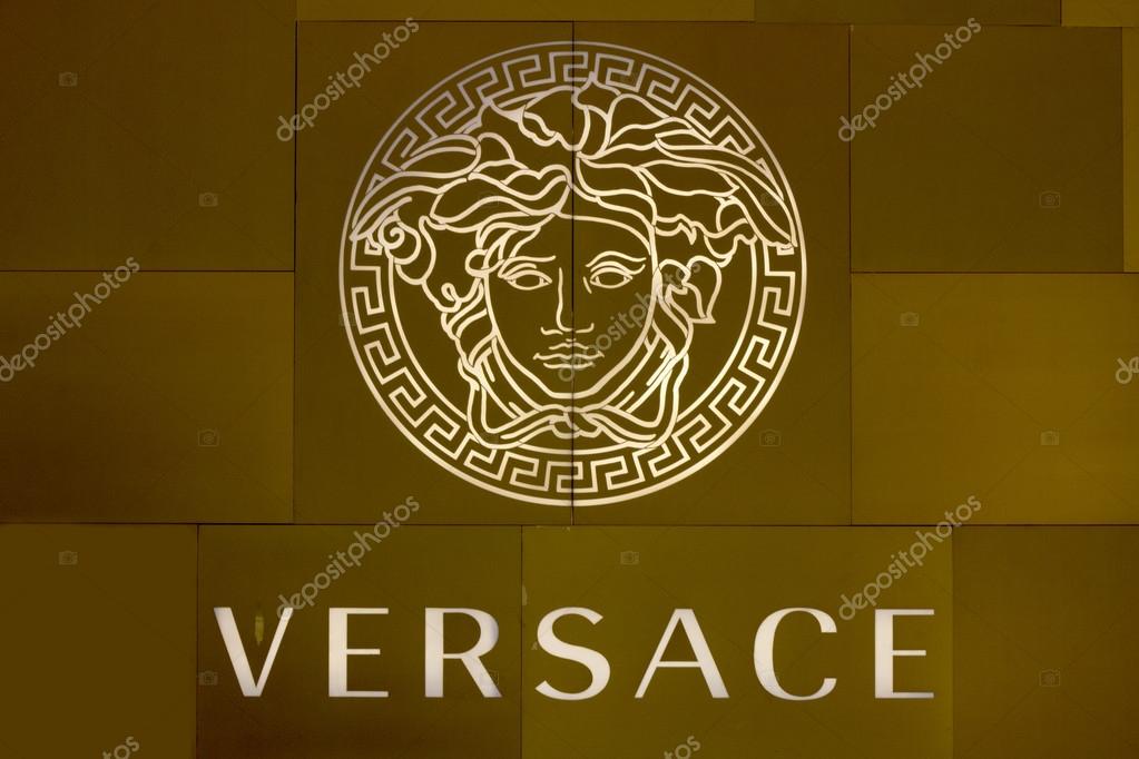 HO CHI MINH CITY, VIETNAM-OCTOBER 31ST 2013: Versace logo on store in Ho Chi Minh City. The logo is based on Medusa who was reputed to be so hideous that men turned to stone when looking at her.
