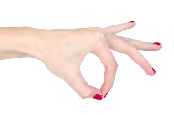 Nő kéz a vörös körömlakkot gazdaság láthatatlan dolog — Stock Fotó