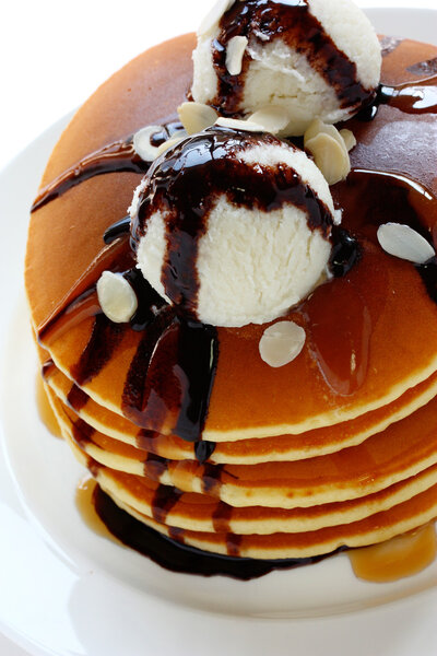 Pancakes topped with ice cream