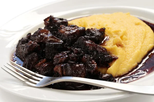 Beef stew with polenta — Stock Photo, Image