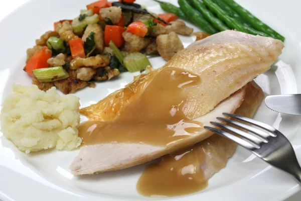 Slices of roast turkey with stuffing — Stock Photo, Image