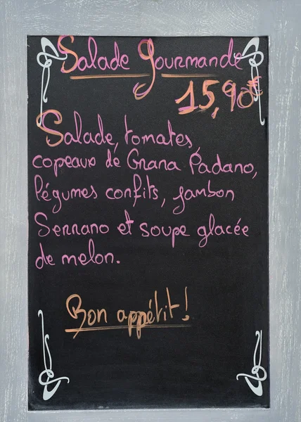 Menu board with advertisement at a French restaurant — Stock Photo, Image