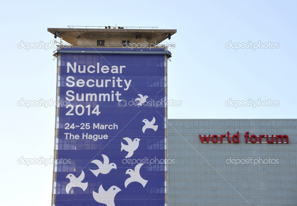 The Hague Holland - March 9, 2014: Large banner on a building, next to the world forum congress center, announcing the Nuclear Security Summit 2014 in The Hague, Holland on March 9, 2014
