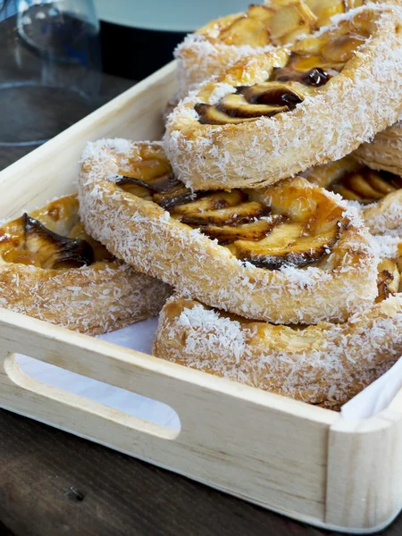 Apple pies in a wooden box. — Stock Photo, Image