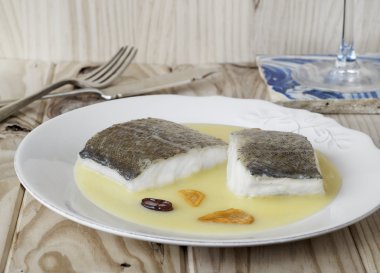 Cod with Pil Pil Sauce, Basque cookery. clipart