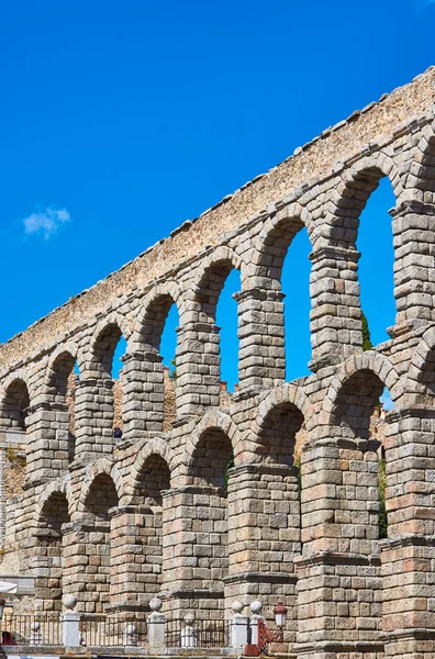 Aqueduct of Segovia, one of the largest in the Roman world, built during the Flavian dynasty. Detail of the two monumental rows of arches. View from Azoguejo square. Segovia, Castile and Leon, Spain.