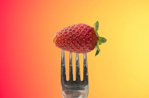Strawberry on fork — Stock Photo, Image