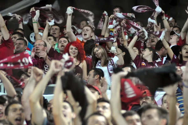 Soccer fans at a stadium — Stock Photo, Image