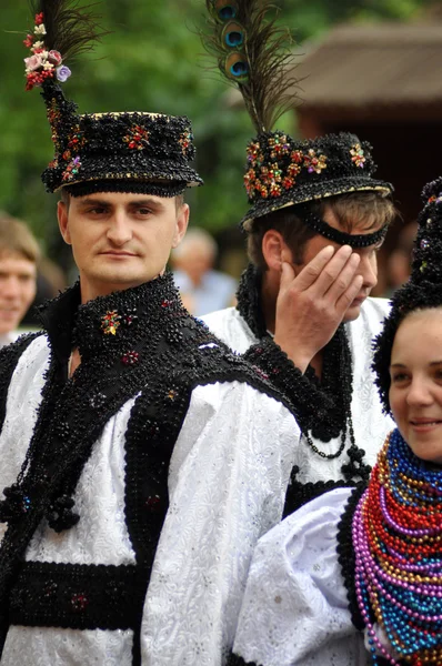 In traditional dresses at a wedding — Stock Photo, Image