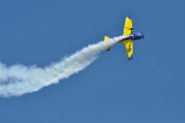 Airplanes skywriting at a Air Show clipart