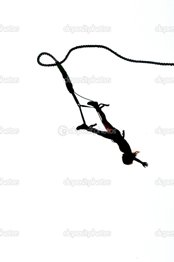 Silhouette of a bungee jumping woman isolated on white background