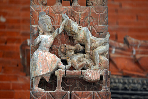 Collection of erotic carvings, explicit Kama Sutra positions on a Nepalese temple in Patan, Kathmandu, Nepal