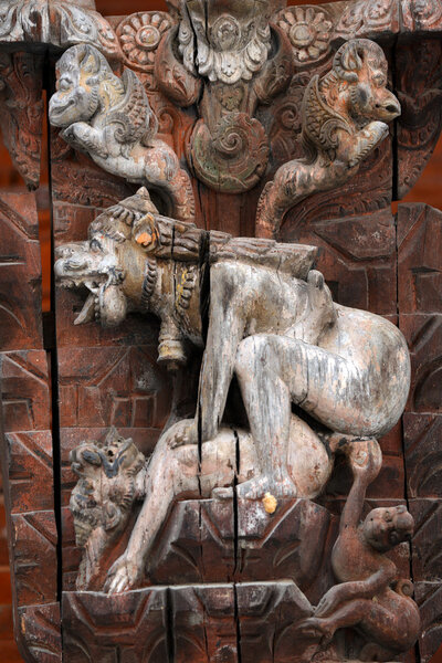 Collection of erotic carvings, explicit Kama Sutra positions on a Nepalese temple in Patan, Kathmandu, Nepal