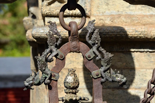 Brass sculpture of a dragon head. Pashupatinath, Nepal — Stock Photo, Image