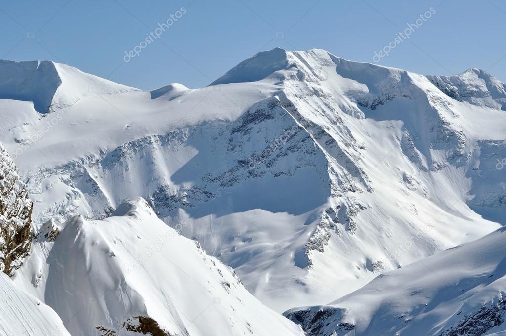 Beautiful mountain massif covered in snow at winter