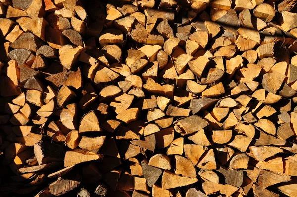 Fondo de madera picada apilada preparada para el invierno —  Fotos de Stock