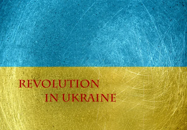 Revolution in Ukraine on the flag of Ukraine — Stock Photo, Image