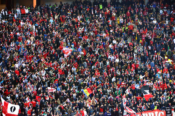 Crowd of football fans in a stadium