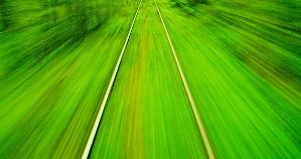 Vista desfocada de movimento do trem o em alta velocidade — Fotografia de Stock